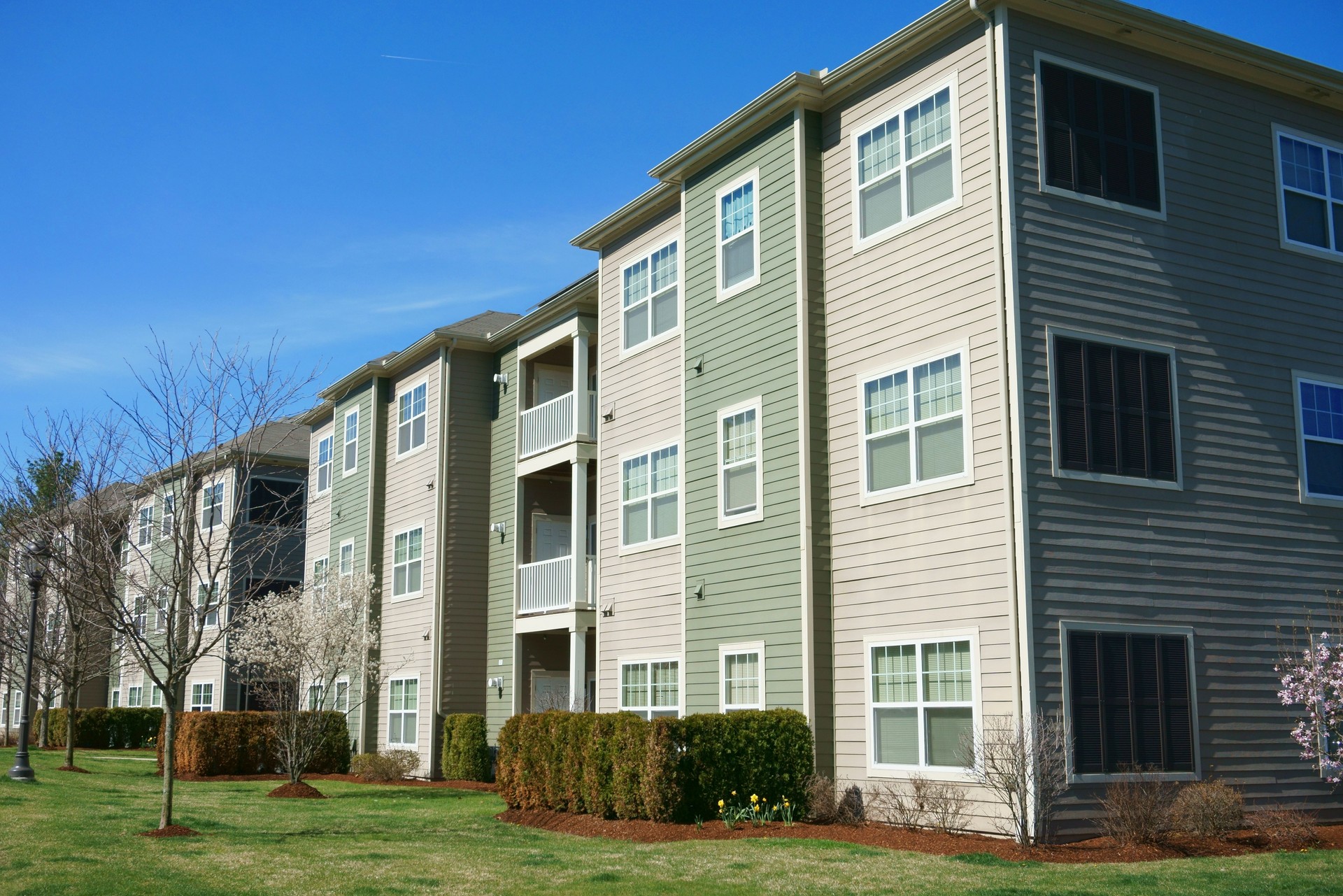 modern rental apartment buildings in sunny day